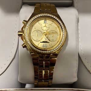 Technomarine. TM-416031 Eva Longoria women’s gold watch.